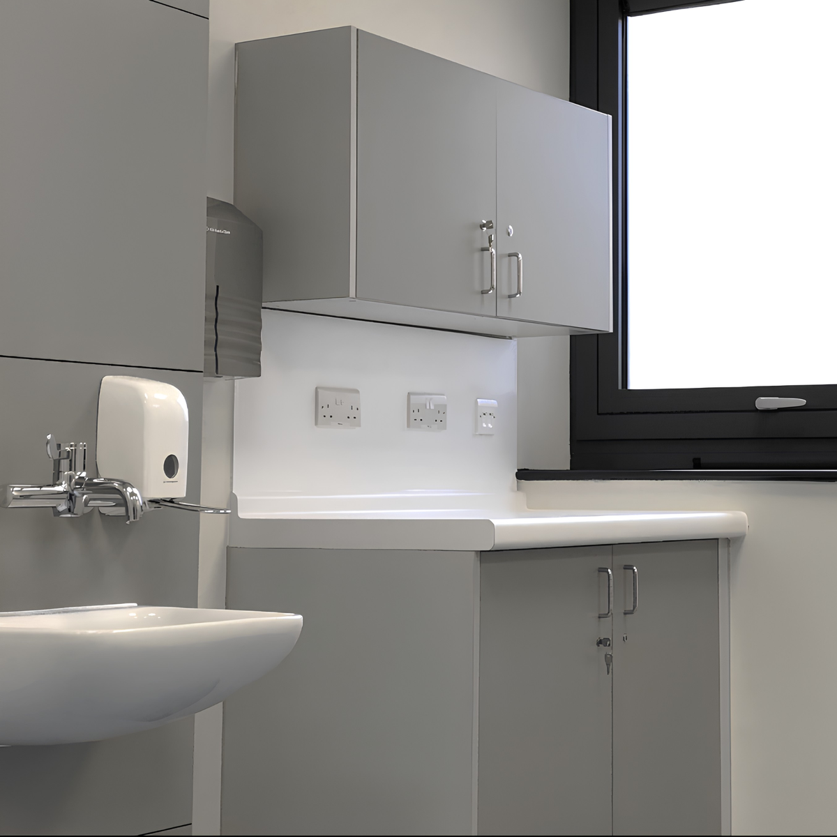 Laminate worktop with integral upstand above a clinical cupboard
