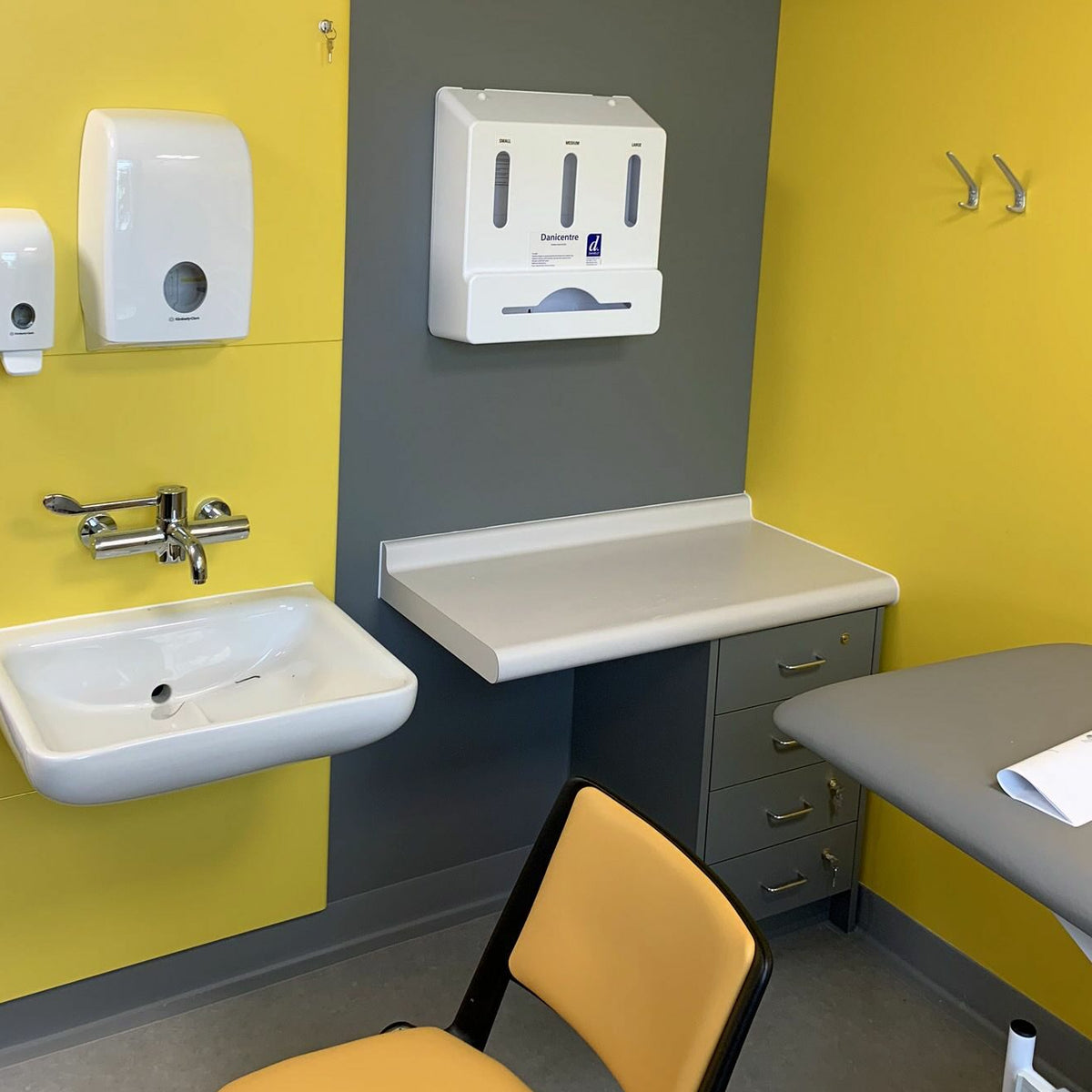 Laminate worktop with integral upstand installed in a hospital clinical area