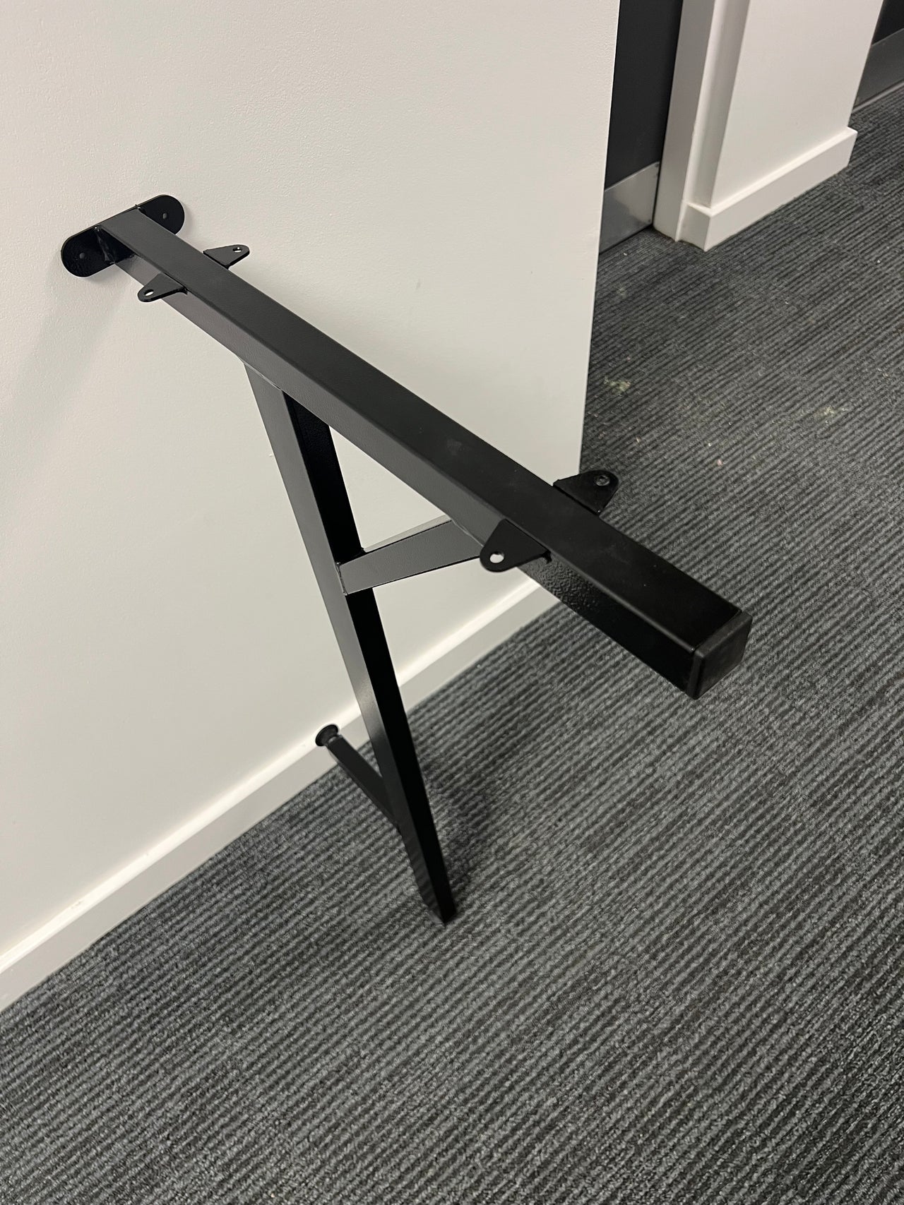 A heavy duty desk support leg