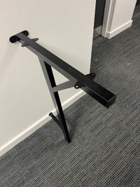 A heavy duty desk support leg