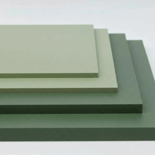 Stack of moisture resistant MR MDF panels in stepped sizes showing the green board