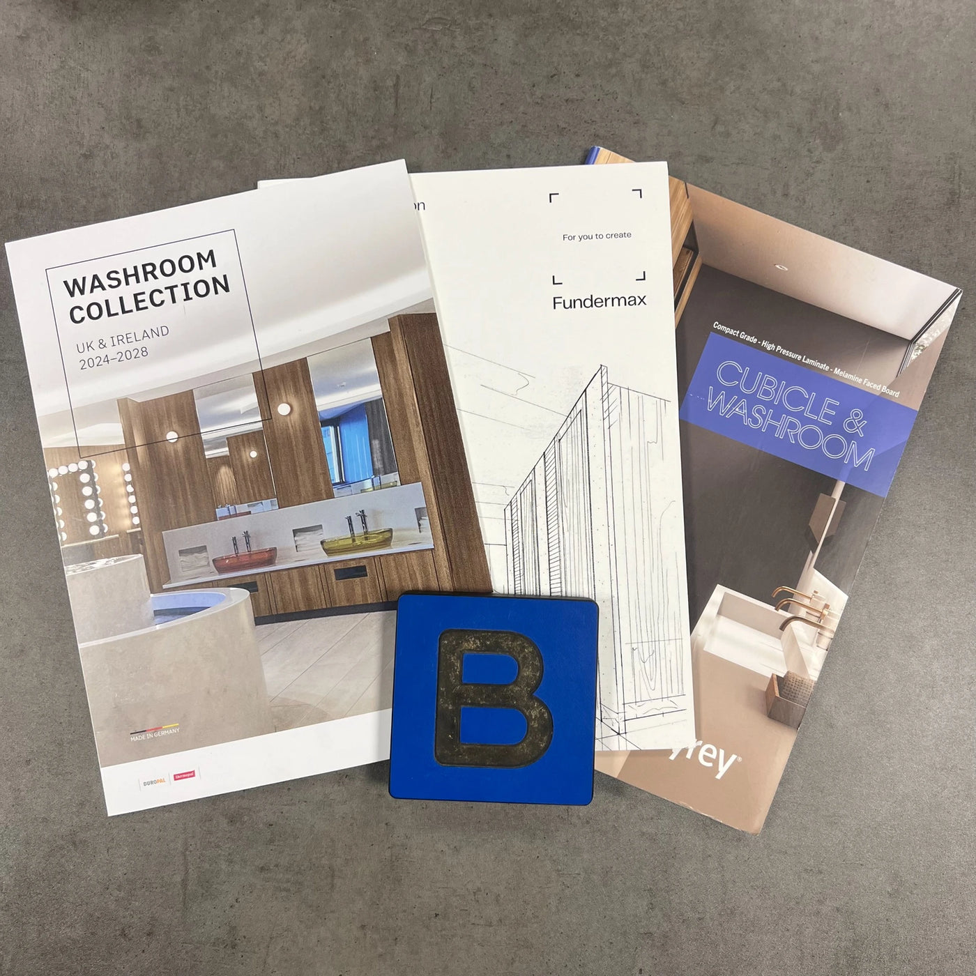 A display showing Bridgewater Direct Compact Grade Laminate Sample and Colour Charts