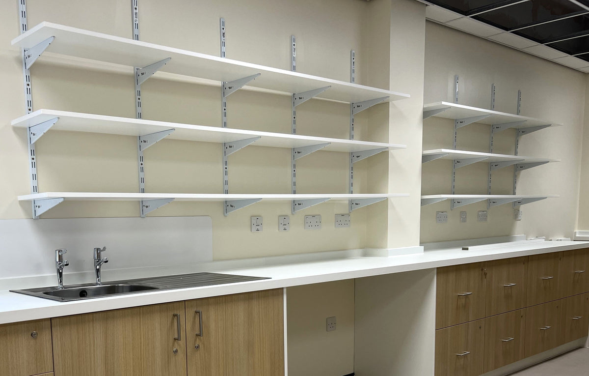 Spur shelving with white laminate shelves uprights and brackets