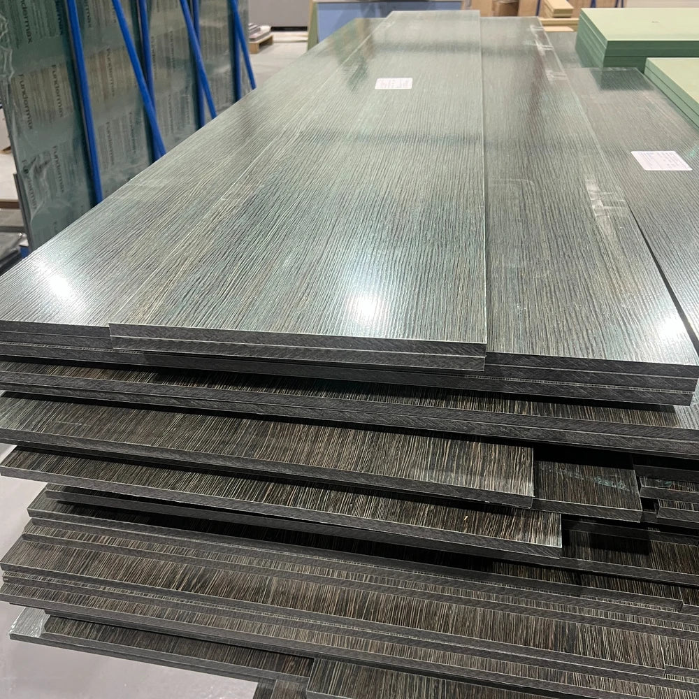 A stack of pre machined Compact Grade Laminate